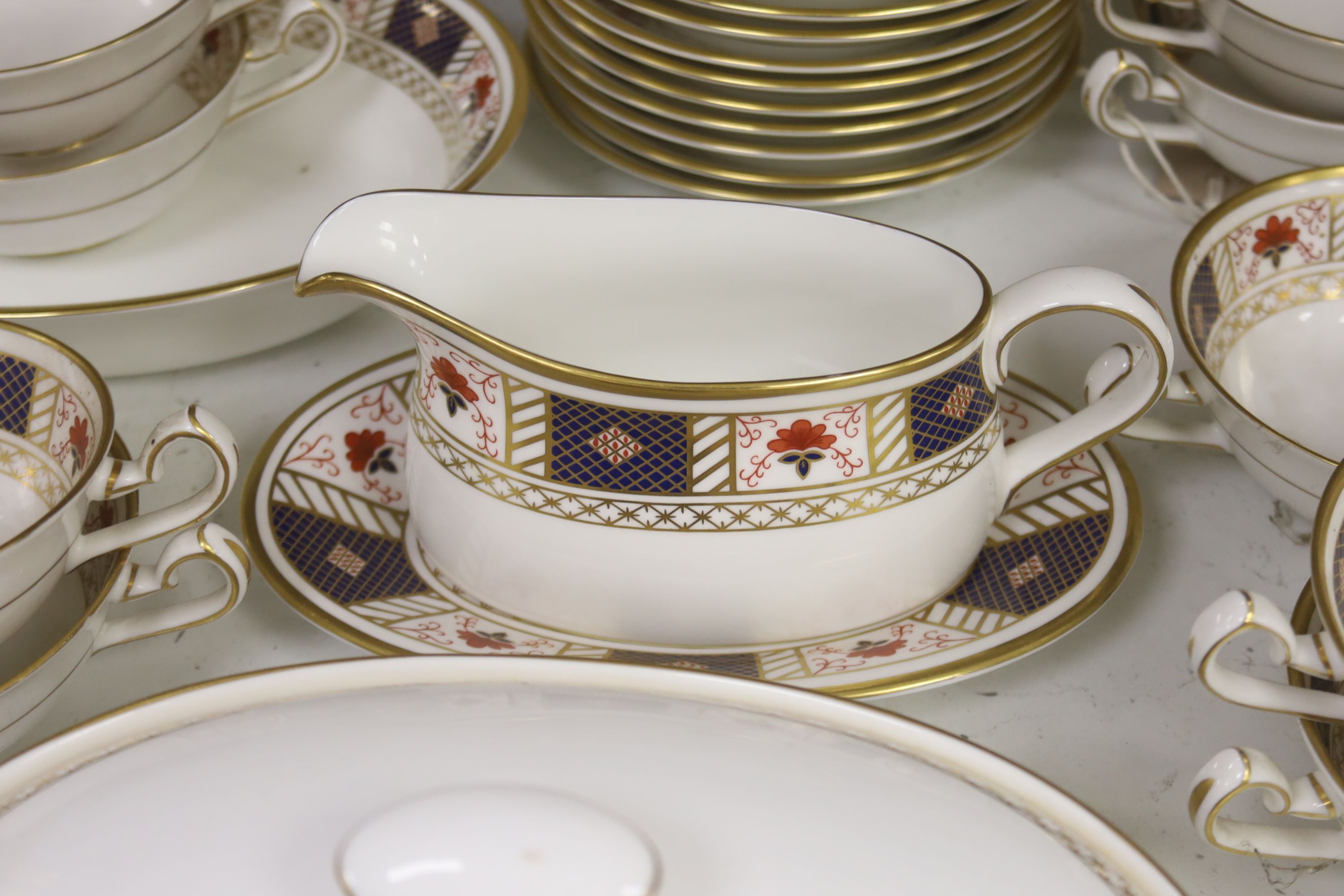 A Royal Crown Derby 'Derby Border' pattern part dinner service